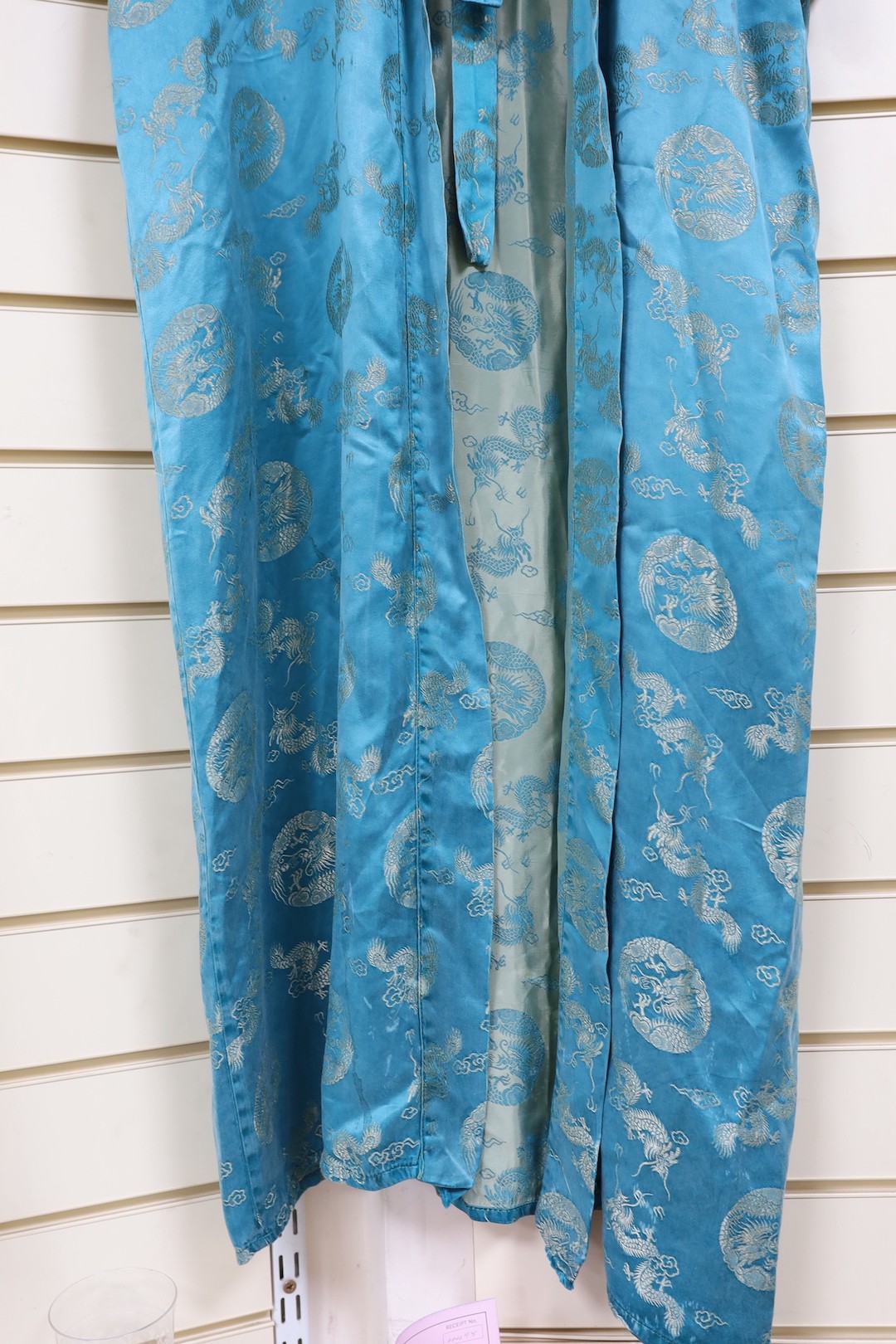 A 20th century Chinese blue brocade embroidered kimono with dragons